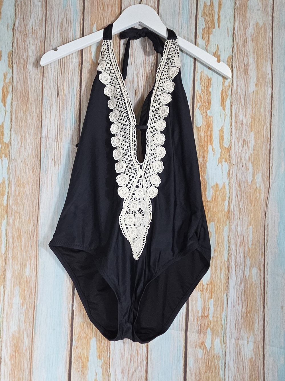 Kona Sol Crochet Trim Plunge One Piece Swimsuit in black. Size L